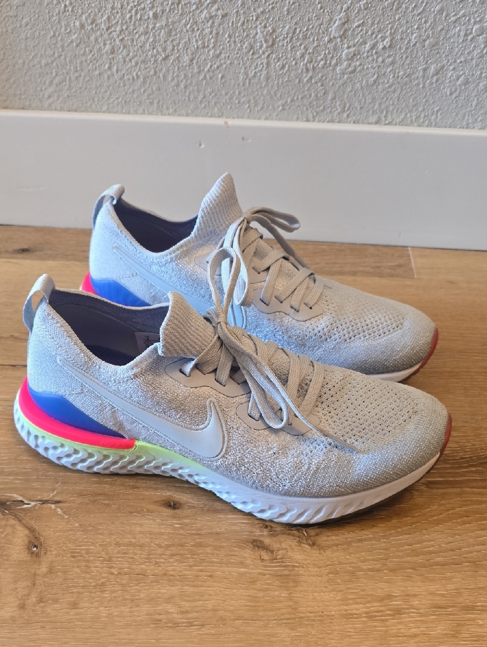 Nike Light Gray Knit Running Shoes with Neon Pink, Blue and Yellow Accents